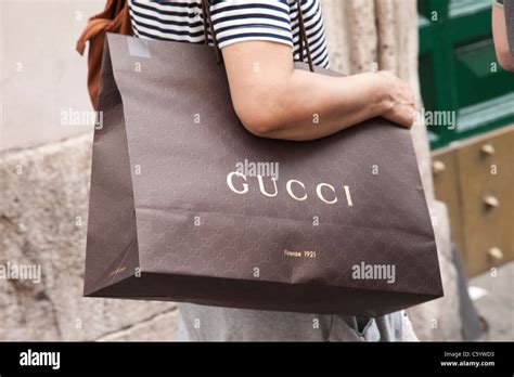 holding gucci